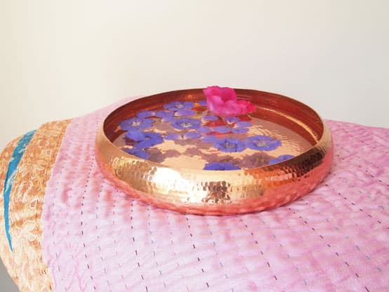 copper bowl pink kantha interior